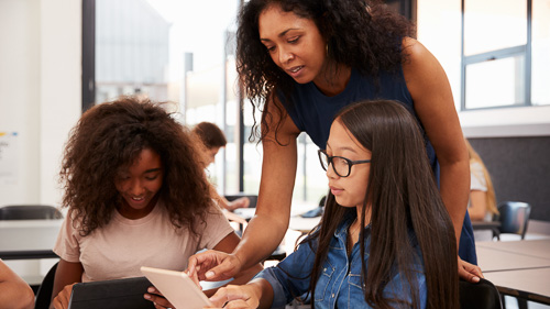 Woman educating students